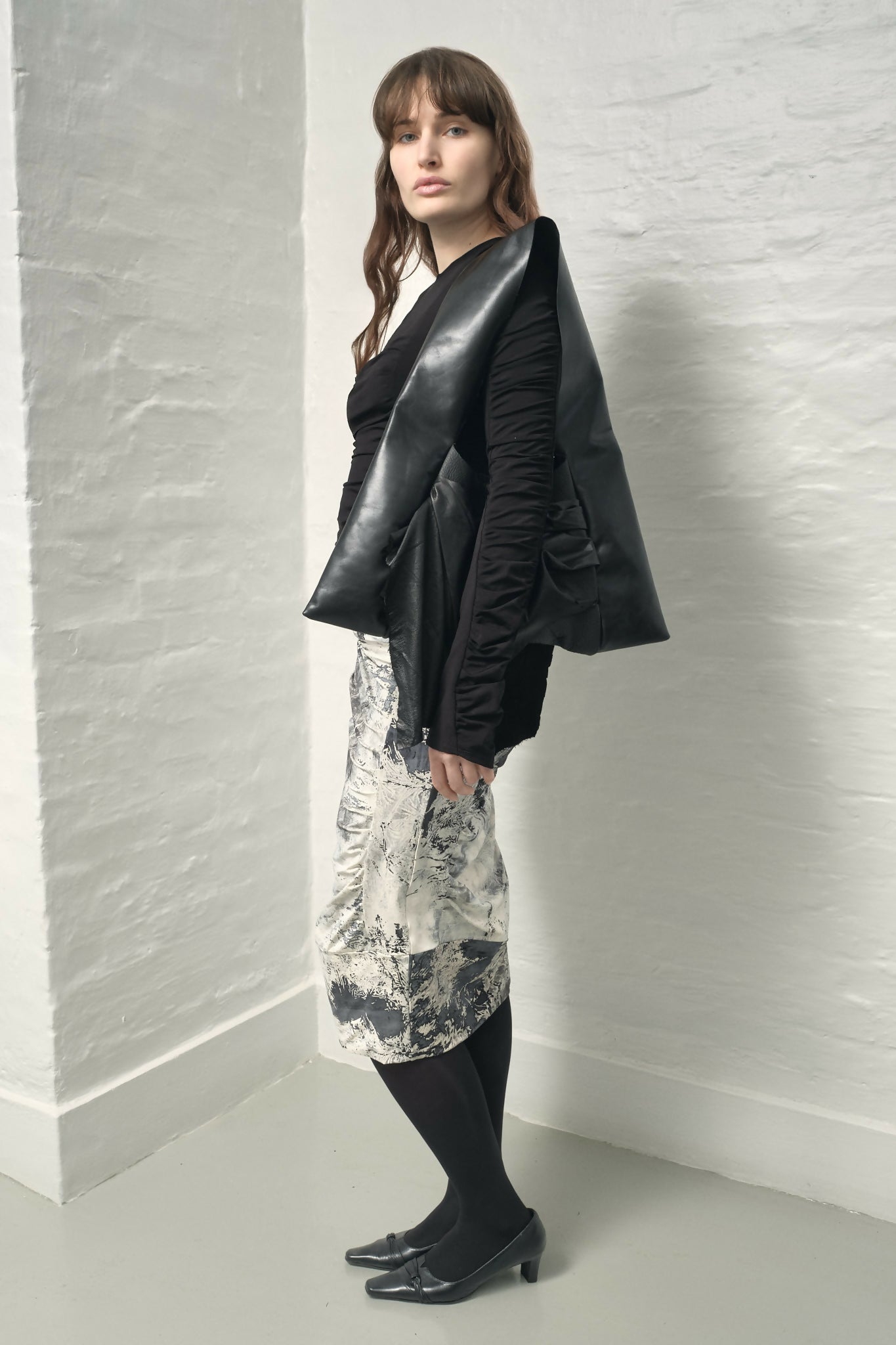 draped raw leather handbag Sahrt