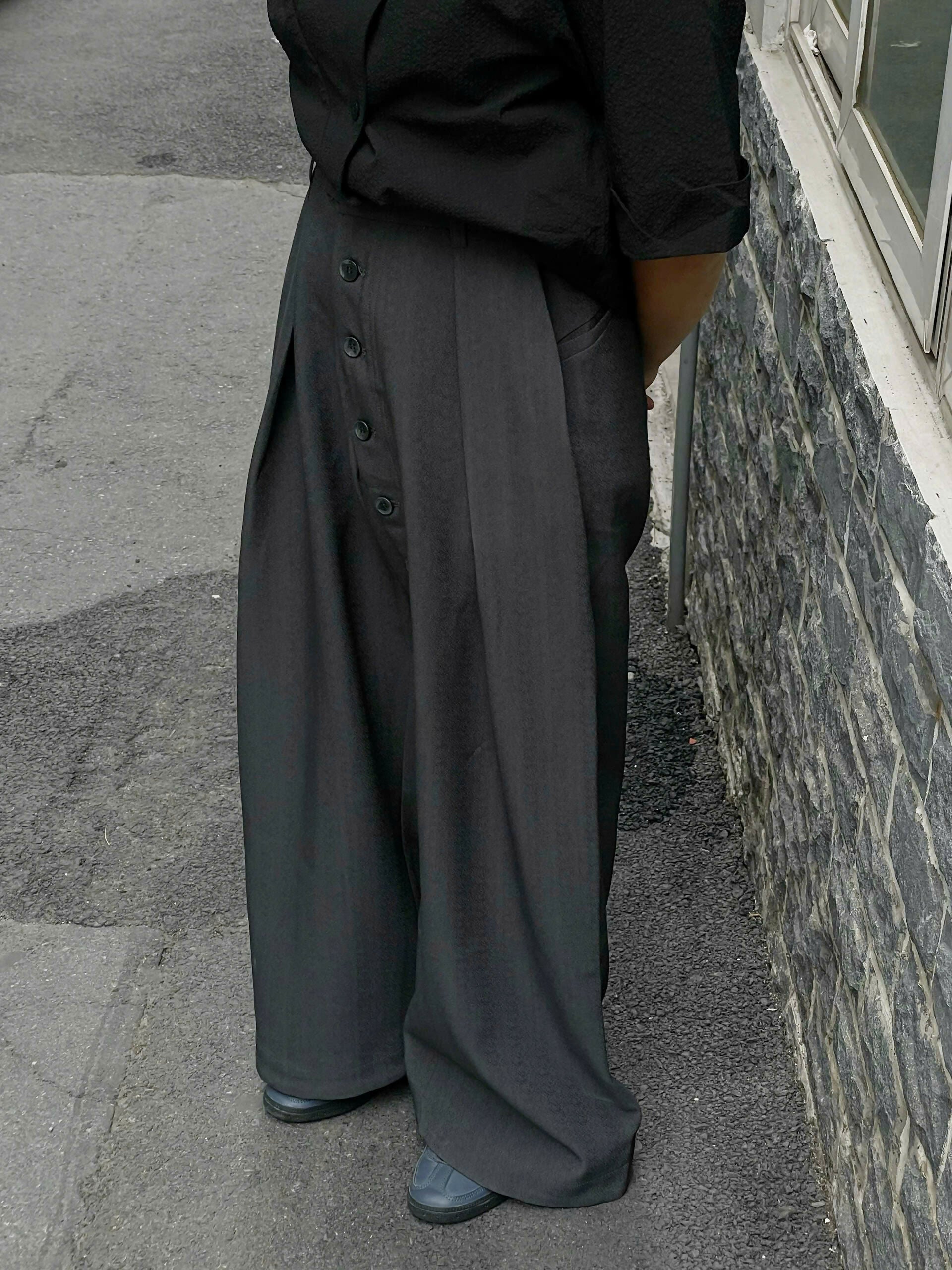 Loose Fit Pleated Buttoned Pants The Futurist Studio
